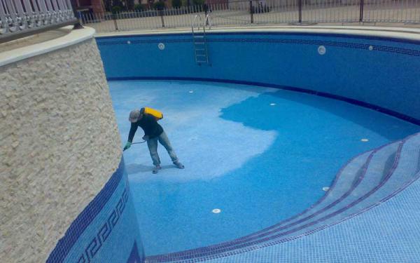 Swimming pool waterproofing and painting with epoxy coating
