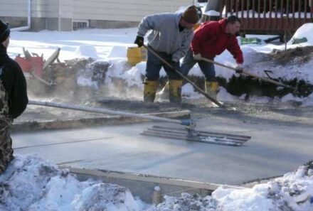 Why does concrete harden slowly in winter?